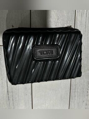 Tumi Black Ribbed Hard Shell Travel Case